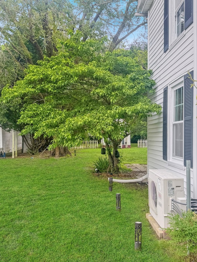 25539 Shoremain Dr, Bloxom, VA 23308 - view of grassy yard with ac unit