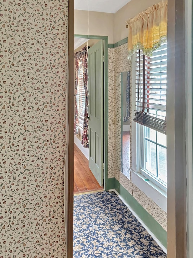 25539 Shoremain Dr, Bloxom, VA 23308 - hallway featuring wallpapered walls and baseboards