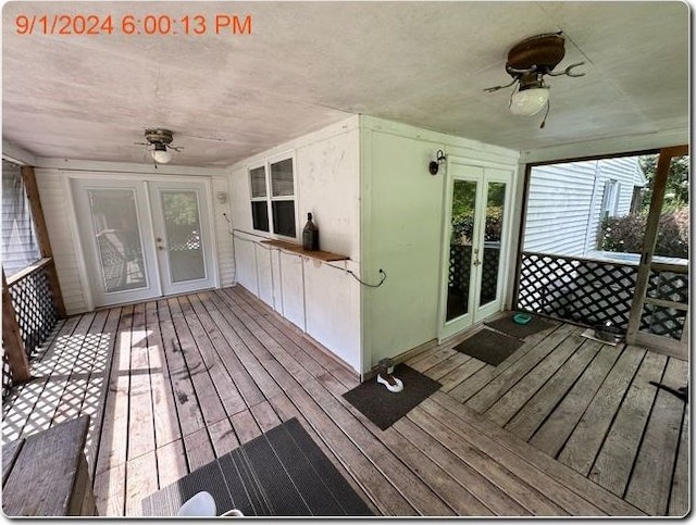 deck featuring ceiling fan and french doors