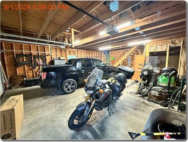 garage featuring a garage door opener