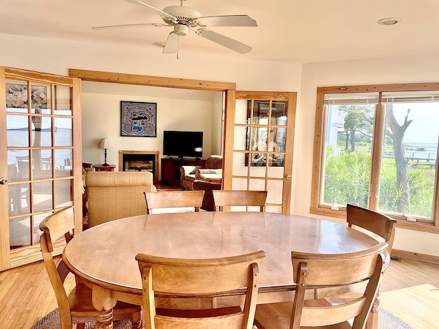 5108 Wildcat Ln, Chincoteague, VA 23336 - dining area with light wood-style flooring, a ceiling fan, and recessed lighting