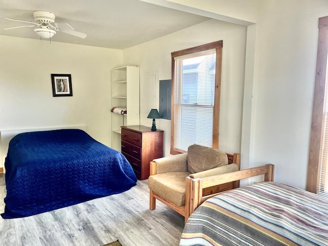 5108 Wildcat Ln, Chincoteague, VA 23336 - bedroom with wood finished floors and a ceiling fan