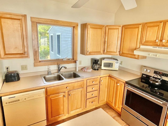 5108 Wildcat Ln, Chincoteague, VA 23336 - kitchen featuring white appliances, under cabinet range hood, light brown cabinets, light countertops, and lofted ceiling