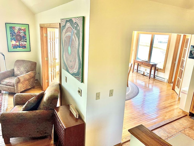5108 Wildcat Ln, Chincoteague, VA 23336 - living area with lofted ceiling and light wood-type flooring