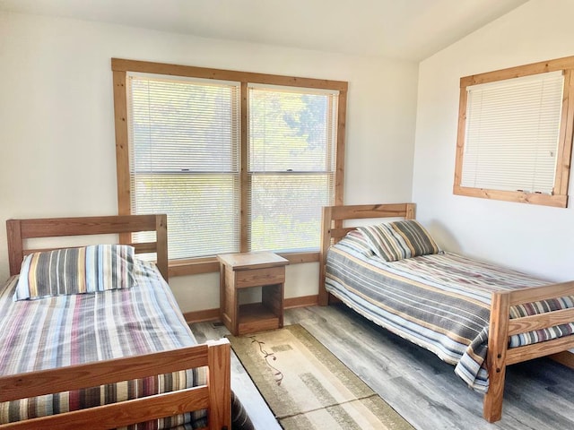 5108 Wildcat Ln, Chincoteague, VA 23336 - bedroom featuring light wood finished floors and lofted ceiling