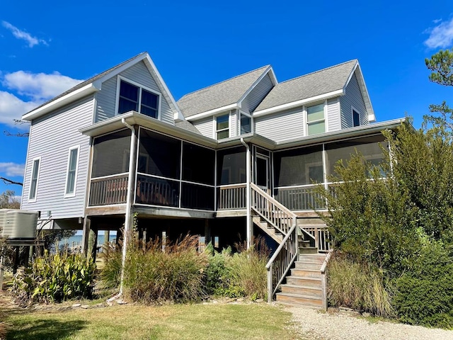 5108 Wildcat Ln, Chincoteague, VA 23336 - rear view of property with a sunroom and stairs