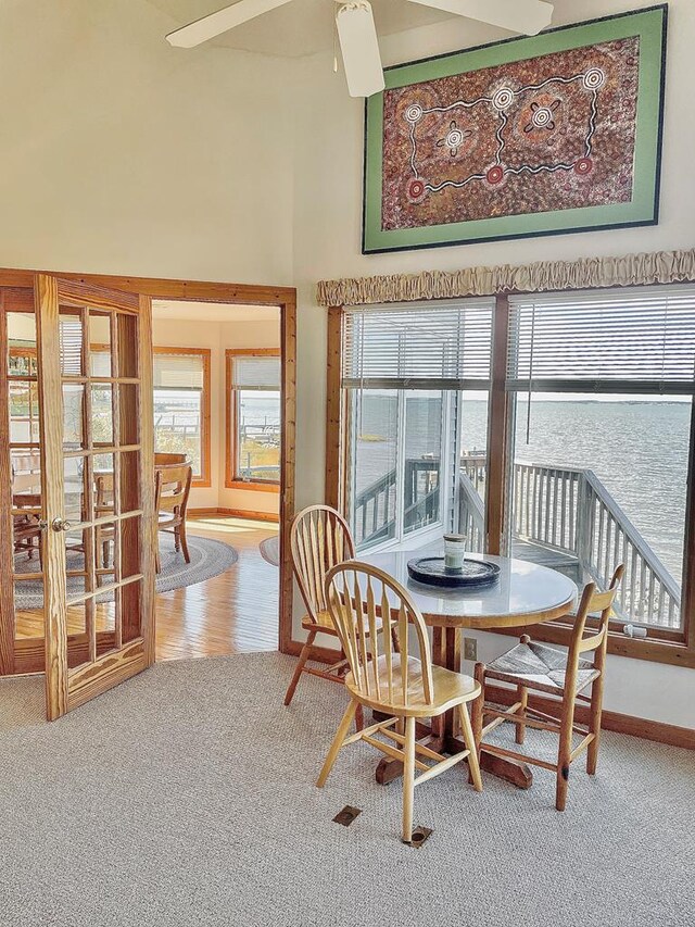 5108 Wildcat Ln, Chincoteague, VA 23336 - carpeted dining area with baseboards