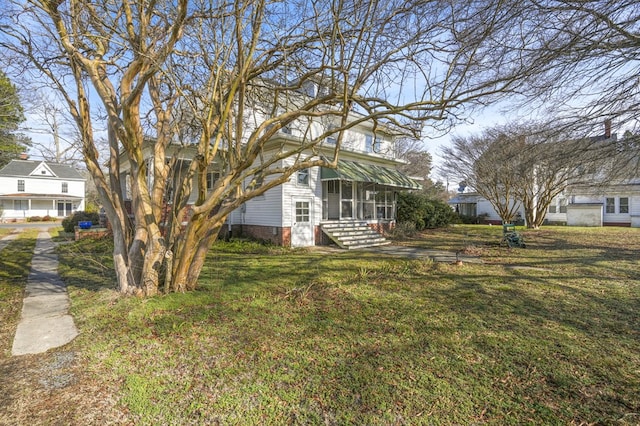 exterior space featuring a front yard