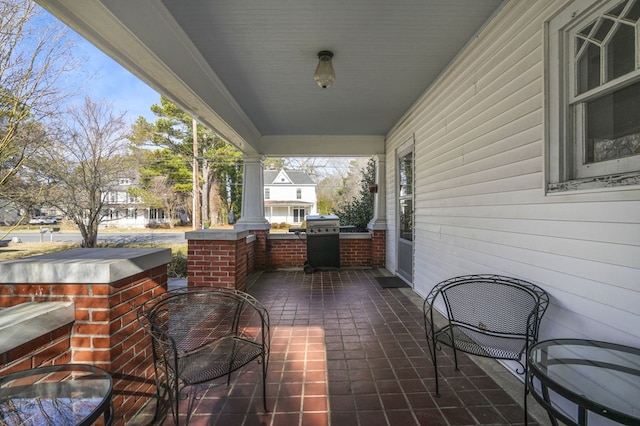 view of patio with covered porch and grilling area