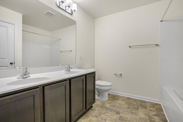 full bathroom with vanity, toilet, and bathing tub / shower combination