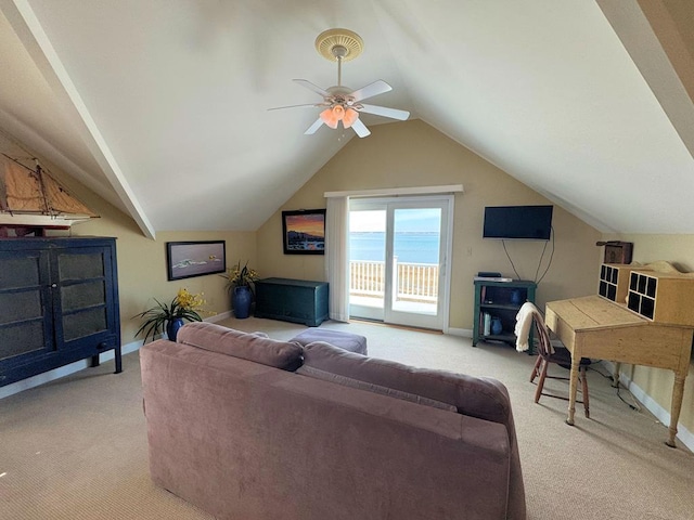 living area with light carpet, baseboards, and vaulted ceiling