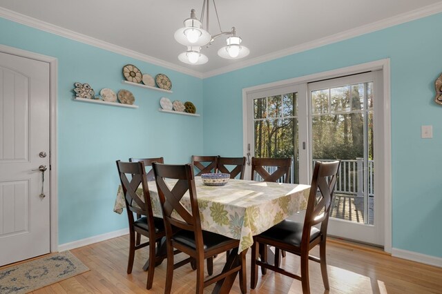 bedroom featuring access to exterior, ceiling fan, and light wood-type flooring