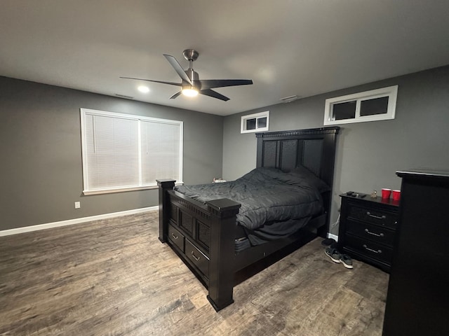 bedroom featuring ceiling fan and hardwood / wood-style flooring