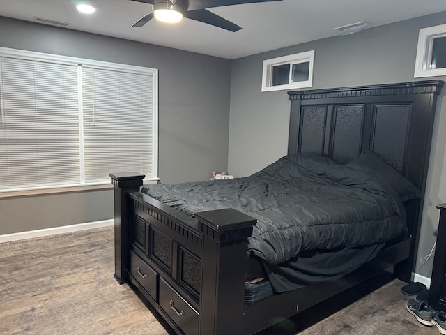 bedroom featuring ceiling fan and light hardwood / wood-style flooring