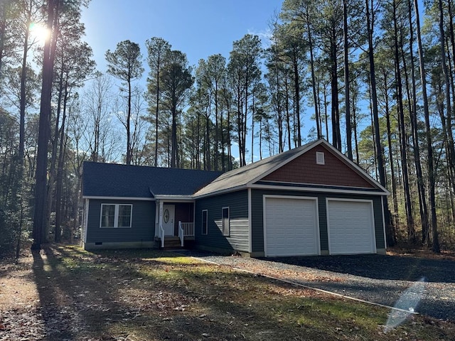 single story home with a garage