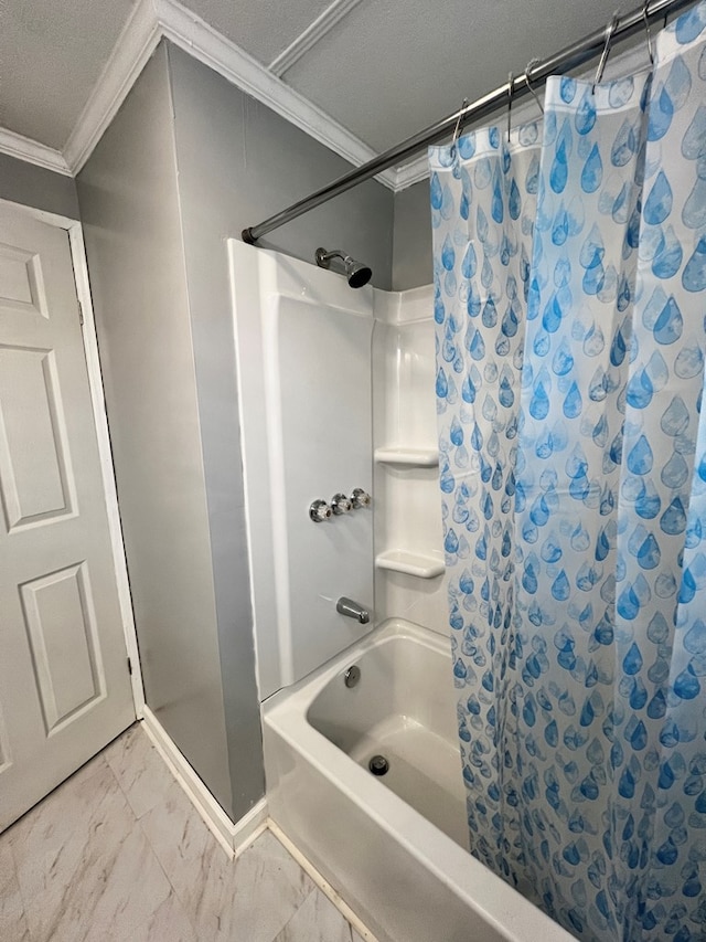 bathroom featuring ornamental molding, shower / bath combo, and a textured ceiling