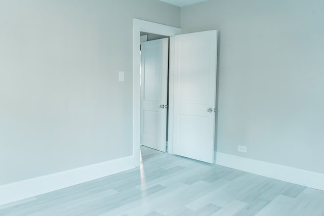 unfurnished bedroom with light hardwood / wood-style floors