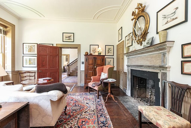 sitting room featuring dark hardwood / wood-style flooring and ornamental molding