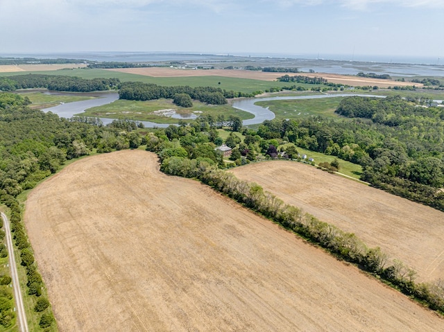 bird's eye view featuring a rural view and a water view