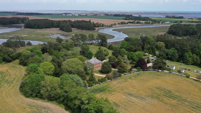 aerial view with a water view and a rural view