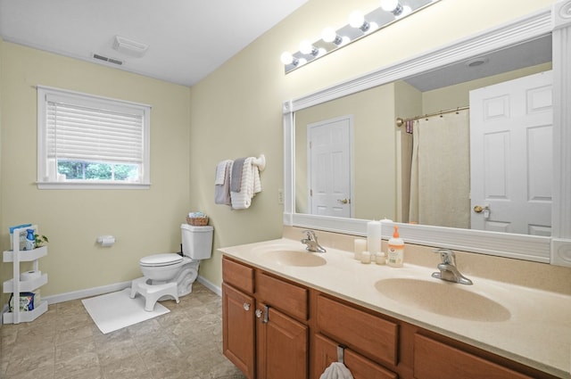 37323 Davey Jones Blvd, Greenbackville, VA 23356 - bathroom featuring baseboards, double vanity, toilet, and curtained shower