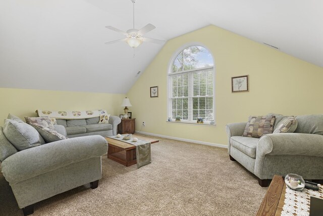 37323 Davey Jones Blvd, Greenbackville, VA 23356 - living room with light carpet, lofted ceiling, ceiling fan, and baseboards