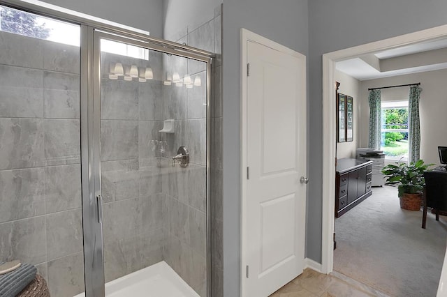 bathroom featuring an enclosed shower