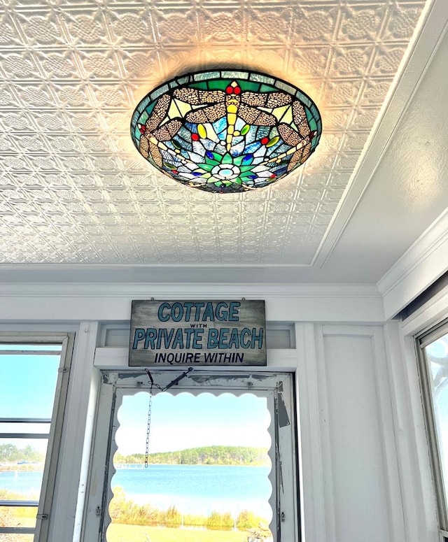 room details with an ornate ceiling and ornamental molding