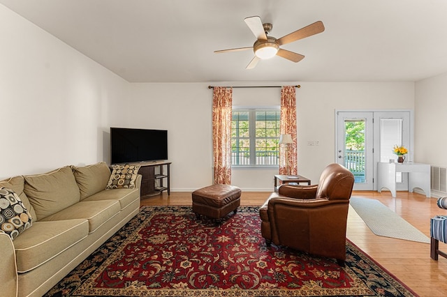 9333 Red Bank Rd, Nassawadox, VA 23413 - living area with wood finished floors, ceiling fan, and baseboards