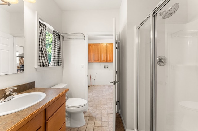9333 Red Bank Rd, Nassawadox, VA 23413 - bathroom with toilet, a stall shower, and vanity