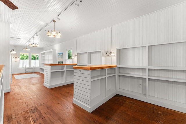 9333 Red Bank Rd, Nassawadox, VA 23413 - kitchen with track lighting, a chandelier, wooden counters, wood-type flooring, and hanging light fixtures