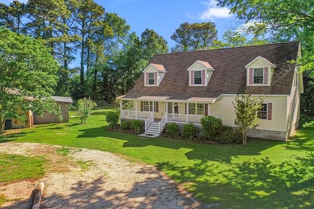 9333 Red Bank Rd, Nassawadox, VA 23413 - cape cod house with a porch, a front yard, and a shingled roof