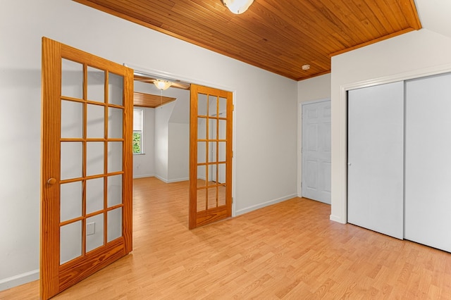 9333 Red Bank Rd, Nassawadox, VA 23413 - unfurnished bedroom with french doors, wood ceiling, wood finished floors, a closet, and lofted ceiling