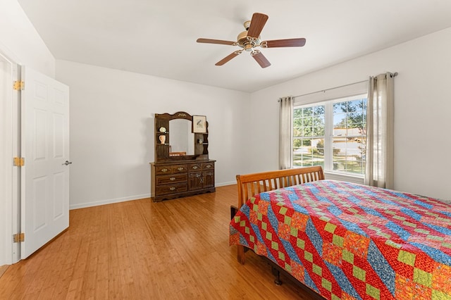 9333 Red Bank Rd, Nassawadox, VA 23413 - bedroom with wood finished floors, baseboards, and a ceiling fan