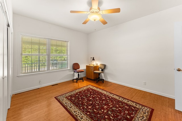 9333 Red Bank Rd, Nassawadox, VA 23413 - sitting room with wood finished floors, ceiling fan, and baseboards