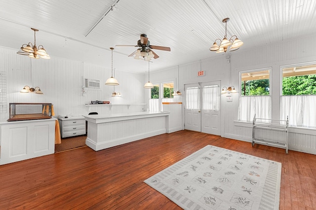 9333 Red Bank Rd, Nassawadox, VA 23413 - living area featuring a chandelier, a ceiling fan, and hardwood / wood-style floors