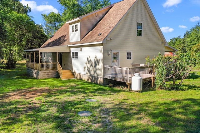 9333 Red Bank Rd, Nassawadox, VA 23413 - rear view of house with a yard, roof with shingles, and a deck