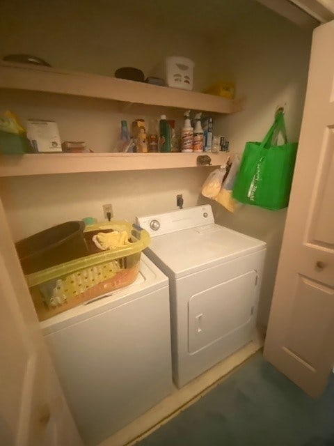 laundry room featuring washer and clothes dryer