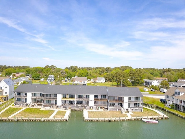 back of house featuring a water view