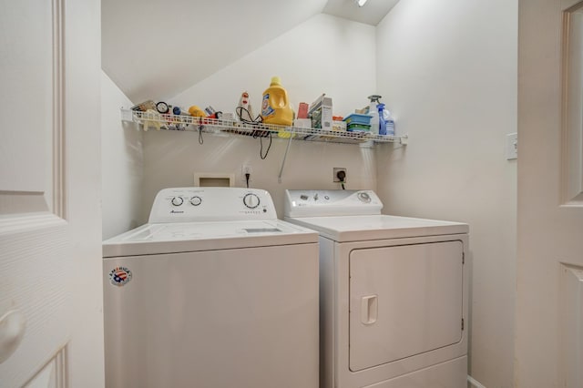 laundry room with laundry area and washer and clothes dryer