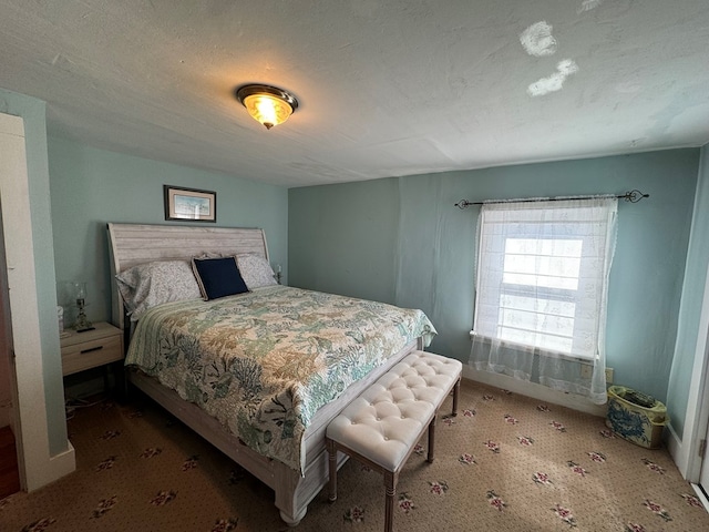 bedroom featuring a textured ceiling