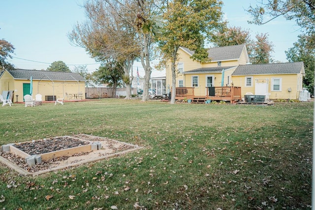 view of yard with a deck