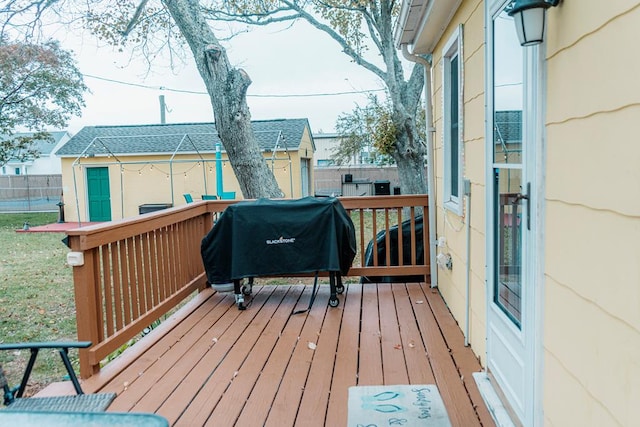 wooden terrace with grilling area