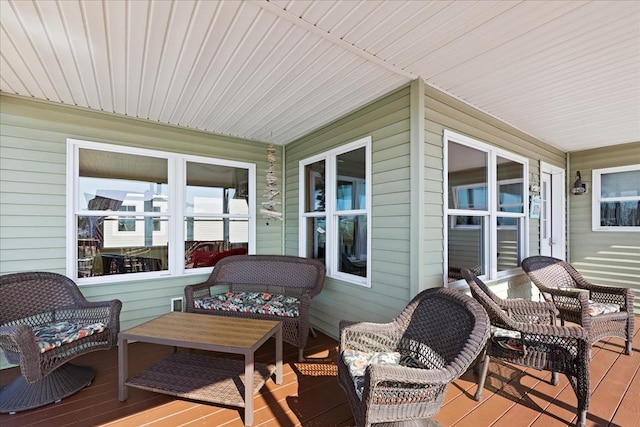 wooden deck featuring covered porch