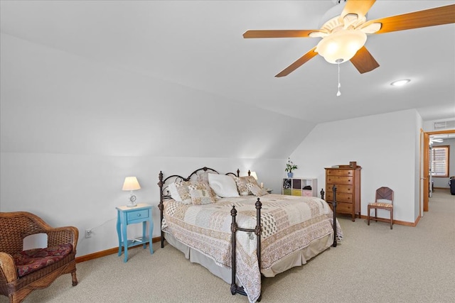 bedroom with lofted ceiling, carpet flooring, a ceiling fan, and baseboards