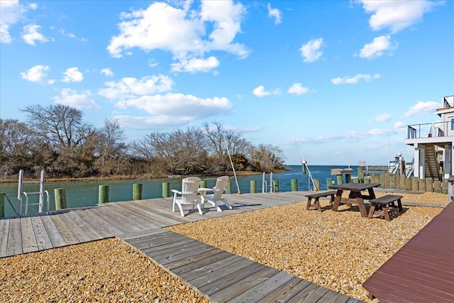 dock area with a water view