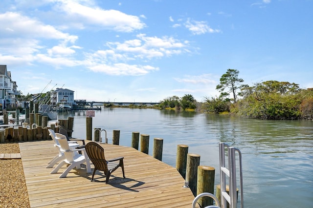 view of dock with a water view