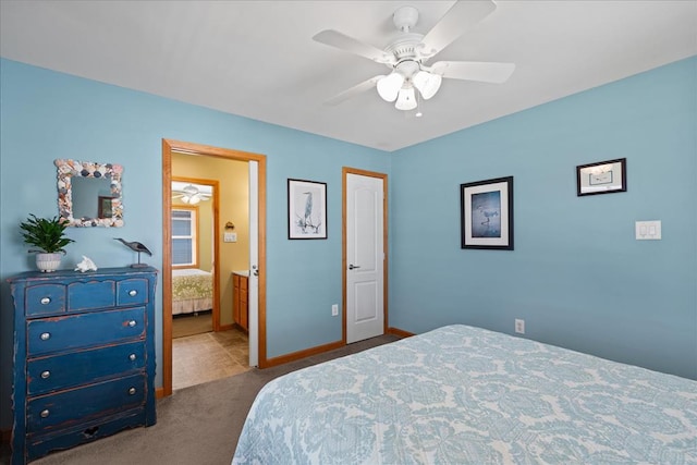 bedroom with ensuite bath, a ceiling fan, baseboards, and carpet floors