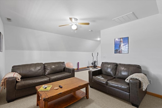 carpeted living area with vaulted ceiling, a ceiling fan, visible vents, and baseboards