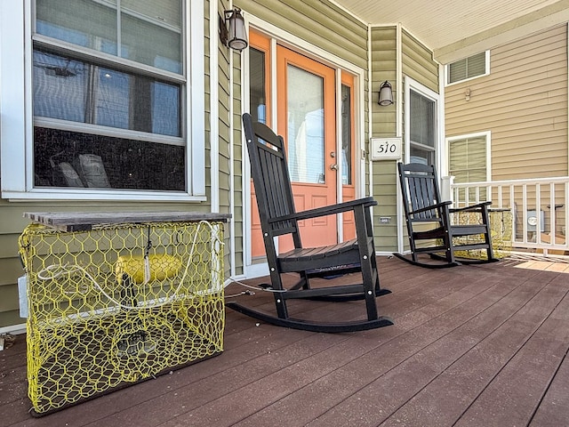 510 Plum St, Cape Charles, VA 23310 - deck featuring a porch